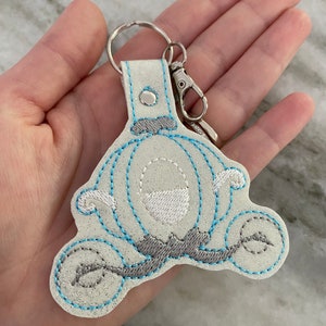 Cinderella pumpkin coach, Sleeping beauty castle key fob, bag charm, Cinderella castle embroidered key fob
