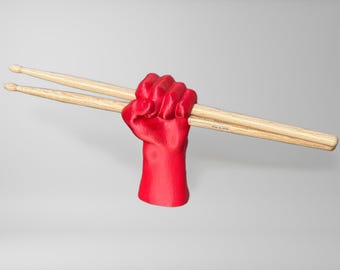 Soporte para baquetas con forma de puño (impreso en 3D)