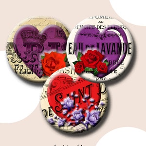 May include: Three 1.313 inch button circles with romantic heart designs. The first button features a purple heart with a crown and the text "Eau de Lavande". The second button features a red heart with the text "De Saint" and purple flowers. The third button features a purple heart with the text "Principe des Fleurs" and red roses.