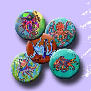 May include: Five 1-inch round buttons featuring colorful octopus illustrations. Each button has a different octopus design with vibrant colors and intricate details. The buttons are perfect for adding a touch of whimsy to any project.