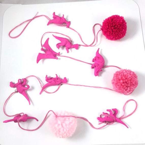 pink dinosaur figures