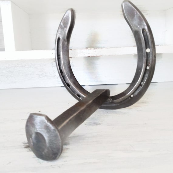 The Heritage Forge Horseshoe Railroad-Spike Toilet Paper Holder