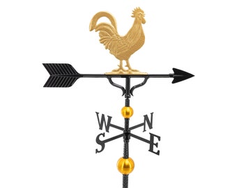 May include: A black metal weather vane with a gold rooster figurine on top. The vane has a compass rose with the letters N, S, E, and W. The rooster is facing to the right.