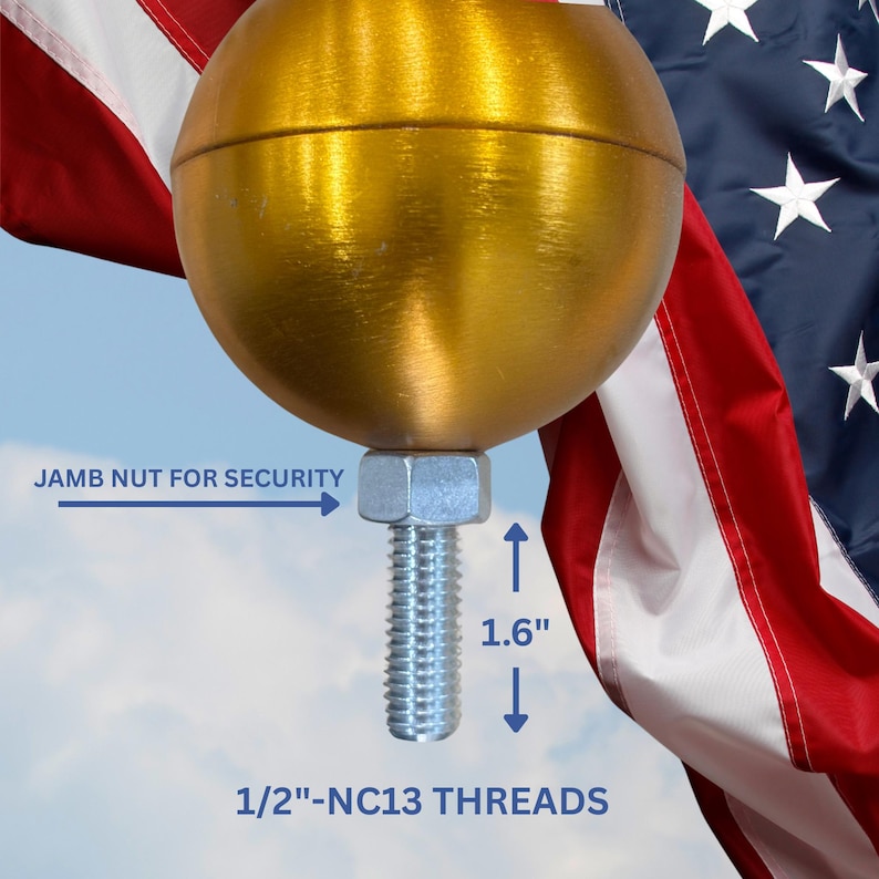 May include: A gold-colored spherical flagpole finial featuring a silver-toned metal threaded bolt and a jamb nut for security. The bolt measures 1.6 inches in length with 1/2-inch-NC13 threads. The finial is positioned in front of a United States flag.