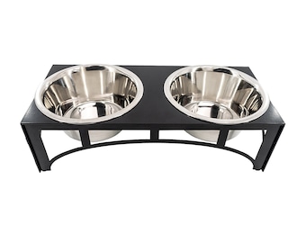May include: Black metal elevated dog bowl stand with two stainless steel bowls.