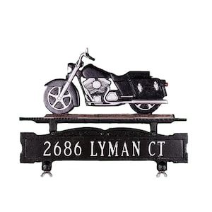 May include: Black metal mailbox with a motorcycle design and the address 2686 Lyman Ct.
