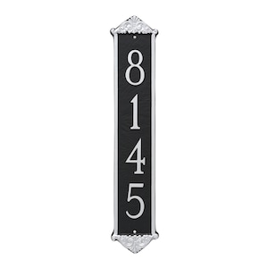 May include: Black and silver vertical house number plaque with the number 8145.