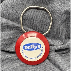 Vintage Daily's Juice Rotary Dial-nyckelring – Reklamannonsering 412 Riktnummer