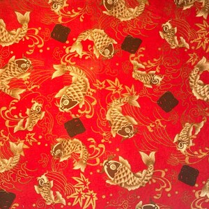 May include: Red fabric with a repeating pattern of koi fish in shades of beige and gold. The design includes stylized waves, leaves, and dark brown square accents. The overall aesthetic is inspired by Japanese art.