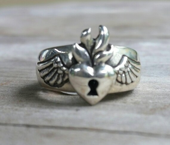 Flaming heart best sale ring