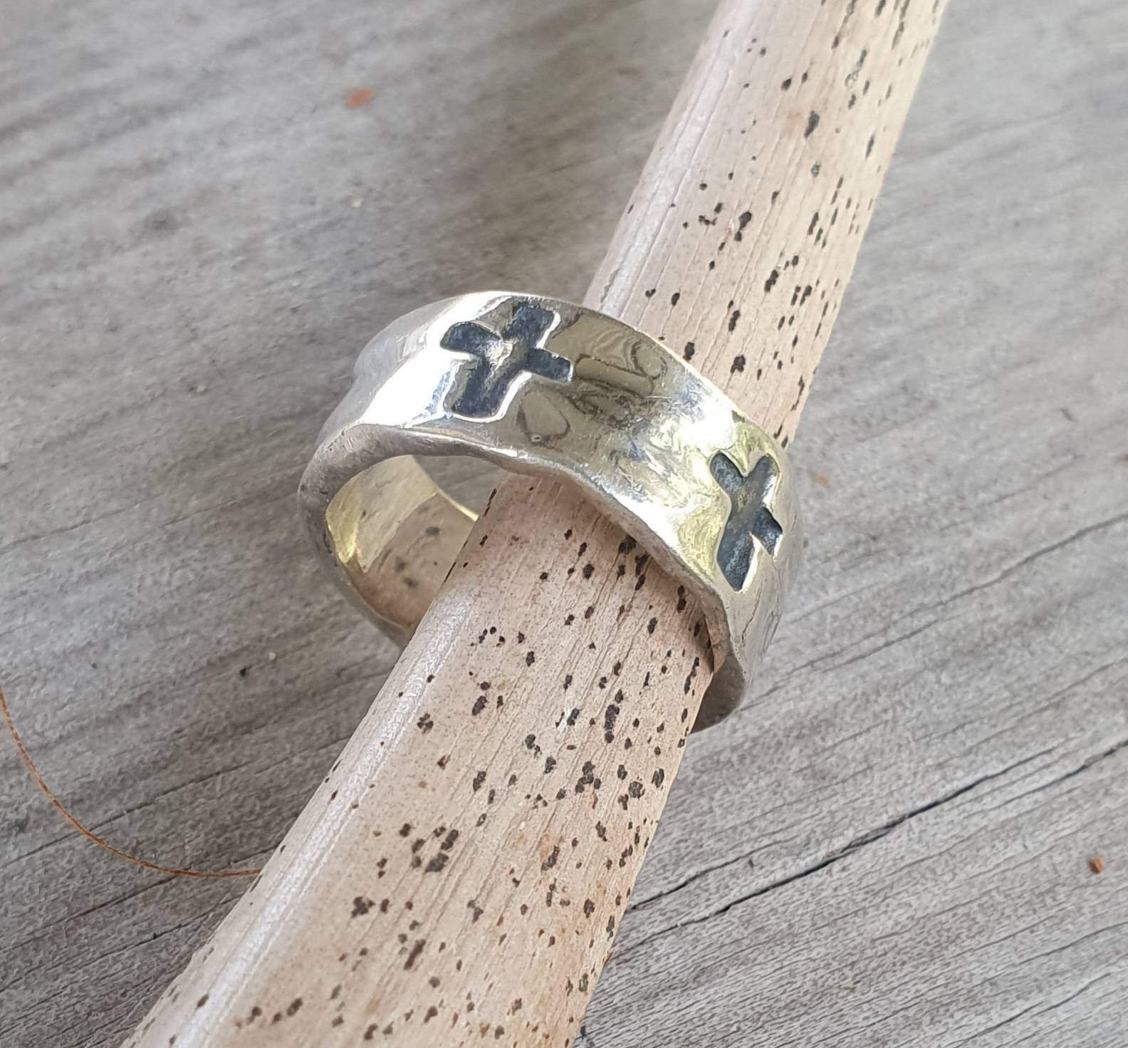 Silver ring with shop cross cutout