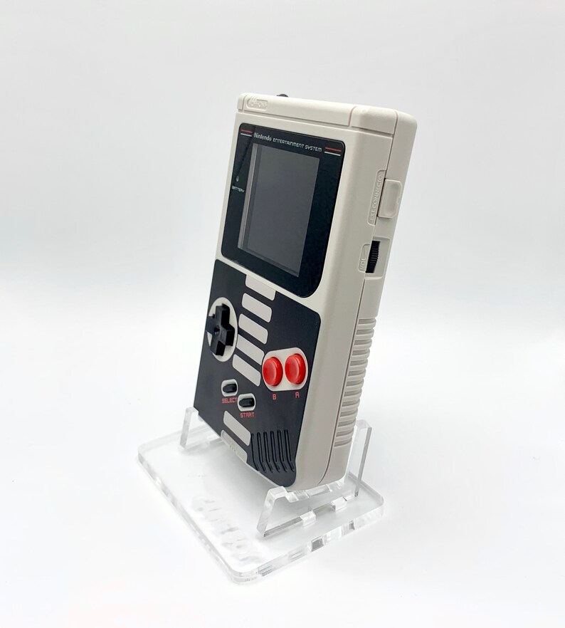 NES Theme Original Game Boy With Backlight Rainbow IPS V3 LCD Screen With 8 Color Modes & Brightness Adjustment. New exterior shell buttons and glass screen.  Protective case and surprise game included as free gifts.