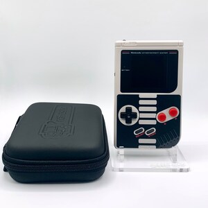 NES Theme Original Game Boy With Backlight Rainbow IPS V3 LCD Screen With 8 Color Modes & Brightness Adjustment. New exterior shell buttons and glass screen.  Protective case and surprise game included as free gifts.