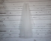 Ivory simple cut edge, 2 tier veil, your choice of length