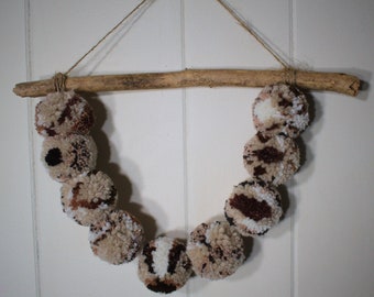 Earth Tone PomPom Wall Hanging 11" long by 12" (9) Pom Poms Strung From Driftwood_ Primitive Wall Art