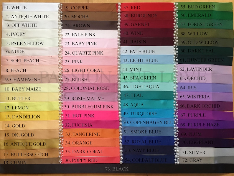 May include: A color chart with 73 different colors of ribbon, each with a number and name. The colors range from white to black, and include shades of pink, blue, green, red, and yellow.