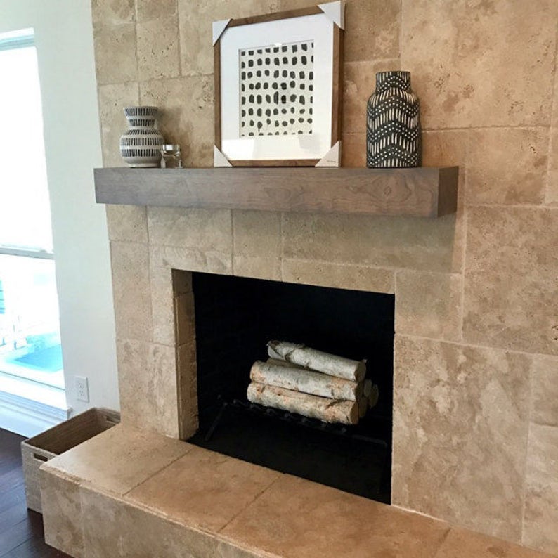 Light grey cherry wood beam mantel.