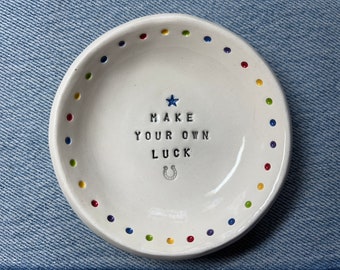 stamped ceramic 'make your own luck' catchall dish