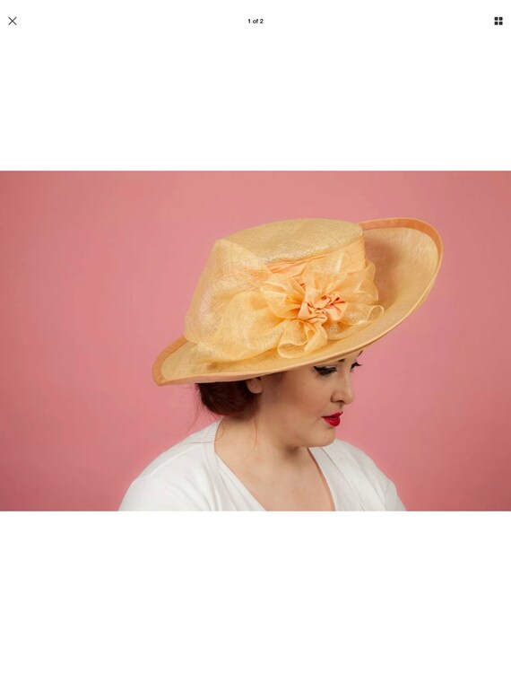 Oversized peach apricot coloured formal hat
