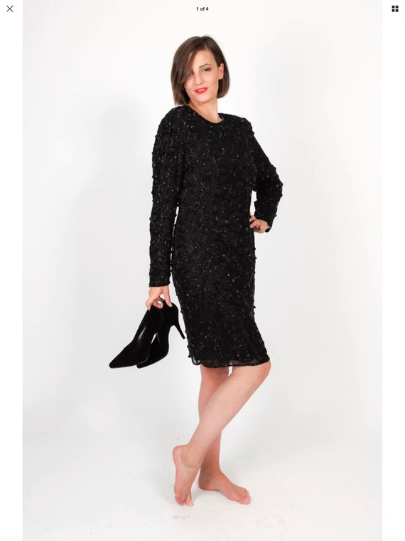 Beautiful heavily beaded long sleeve backless dres