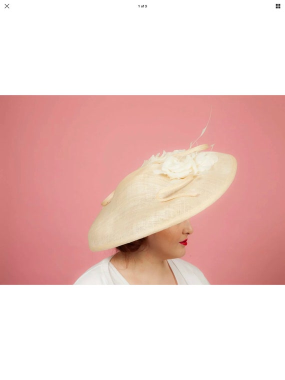 Oversized tweel feathered formal saucer hat with f