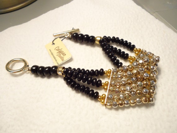 Vintage Multi-Strand Calypso Studios Bracelet Wit… - image 1