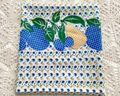 Feedsack fabric in fruit border print, blue yellow green, apples cherries pears, faux cross stitch style, rows of small fruit, sewing quilts