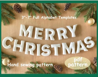 May include: A set of white fabric letters spelling MERRY CHRISTMAS, with text reading 3-7 inch Full Alphabet Templates and Hand sewing pattern, plus a circular label stating pdf pattern, arranged on a wooden surface with pine branches.