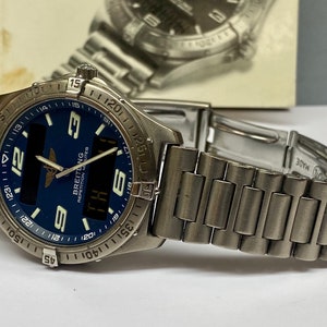 Vintage Breitling Aerospace Ref. E65062 Titanium Quartz Navy Blue Dial Watch image 5