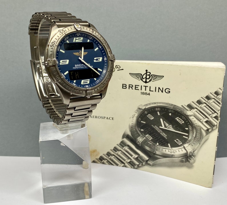 Vintage Breitling Aerospace Ref. E65062 Titanium Quartz Navy Blue Dial Watch image 1
