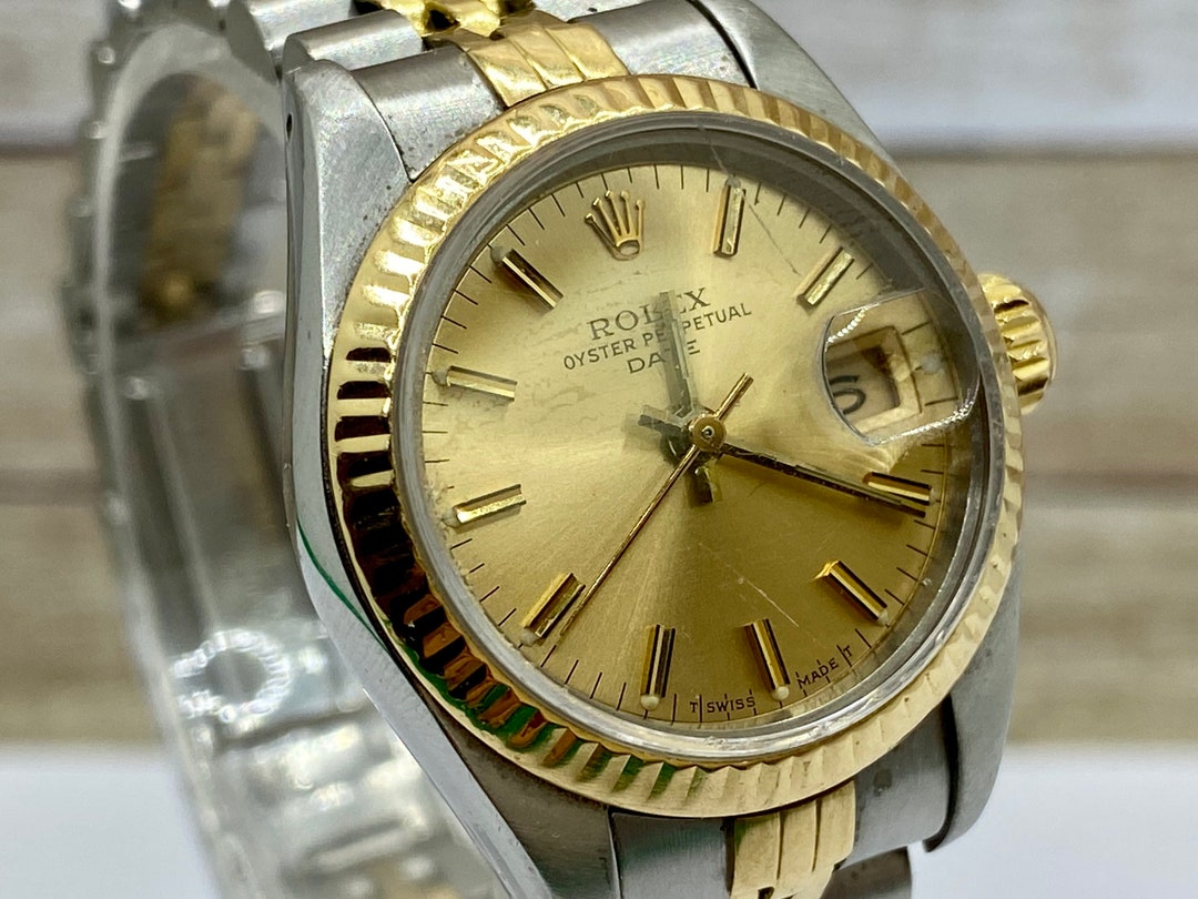 Gold and stainless rolex discount