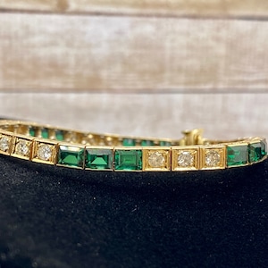 14K Yellow Gold Diamond And Emerald Tennis Bracelet!!!!