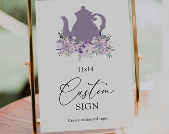Puede incluir: Un cartel con marco dorado con una silueta de tetera morada y un diseño floral. El cartel dice "11x14 Custom Sign Create unlimited signs".