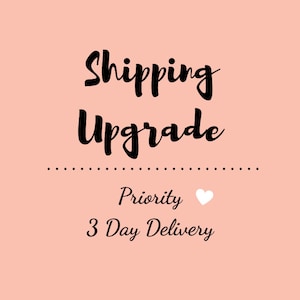 May include: Pink background with black text that reads "Shipping Upgrade" with a dotted line below. Below the line is the text "Priority" with a white heart icon and "3 Day Delivery".