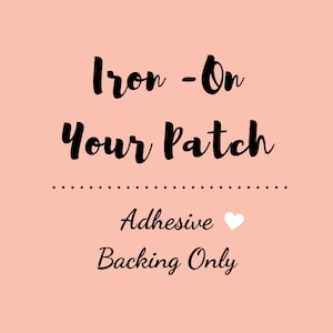 May include: Iron-on patch adhesive backing only. The text is in black on a pink background.