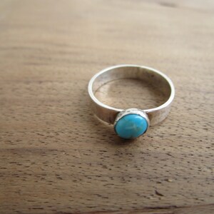 TURQUOISE AND STERLING Silver Ladies Round Ring - It has  a 5MM Round Stone - It is a ladies size  6 3/4 "
