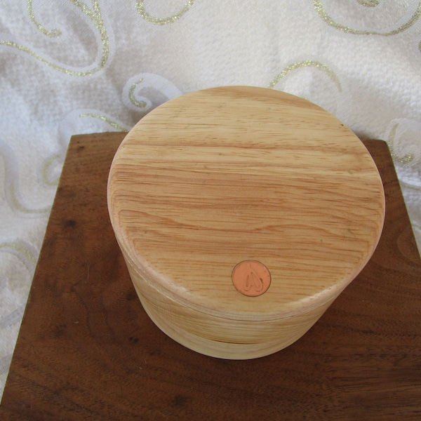 ROUND WOOD TRINKET Box , top opens to side to get inside , 4" in diameter x 3" high ,sighed on bottom ,  3 different colored wood designed