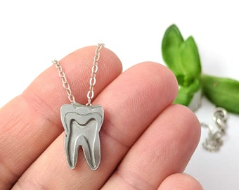 Itty-Bitty Tooth necklace