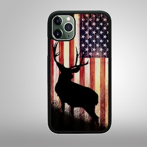 May include: A black phone case with a distressed American flag design and a silhouette of a deer with antlers.