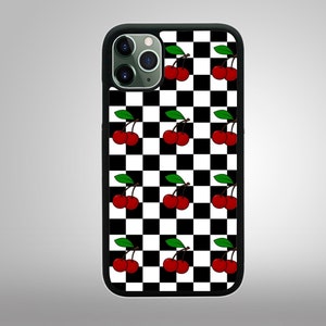 May include: Black and white checkered phone case with a pattern of red cherries. The phone case has a black border and a glossy finish. The cherries have green leaves and are evenly spaced across the case.