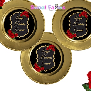 May include: Three gold charger plates with black centers and red roses. The center of each plate features a gold frame with the text "Happy Birthday Geneva!"