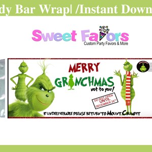 Puede incluir: Envoltorio de barra de caramelo con el Grinch y el texto "Merry Grinchmas". El envoltorio incluye el texto "No abrir hasta el 24 de diciembre" y "Si no se puede entregar, por favor, devolver a Mount Crumpit".