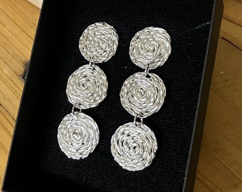 Beautiful hand braided pure silver long earrings, light and classic.