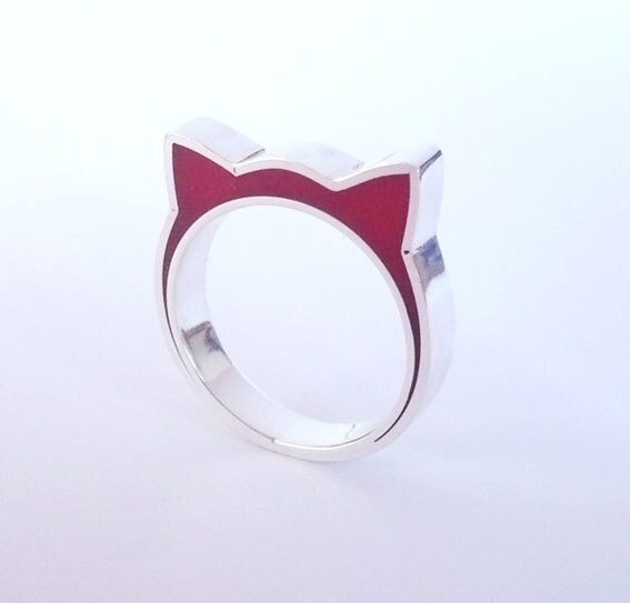 Handmade sterling silver and red resin cat ears ring.