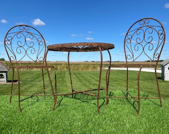 Cast iron garden table and 2 chairs cheap