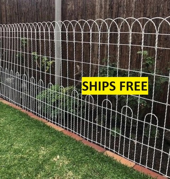 Fencing in the Vegetable Garden. Installing welded wire fence