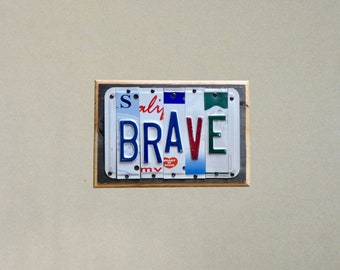 Brave custom sign made with repurposed license plates