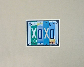 XOXO custom sign made with repurposed license plates