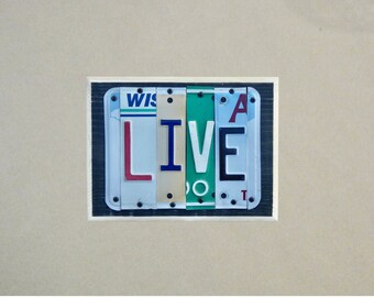 Live custom sign made with repurposed license plates