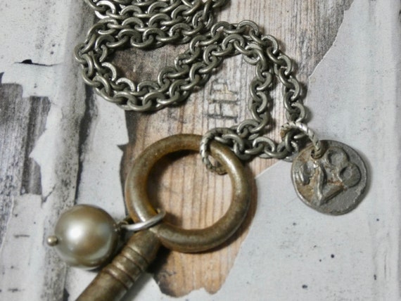 Vintage barrel key and date nail #28 necklace, an… - image 1